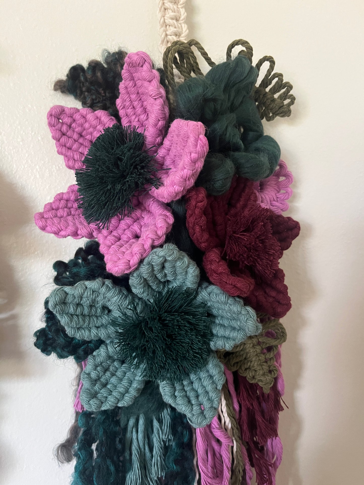 Lilac, Evergreen, + plum floral wall hanging