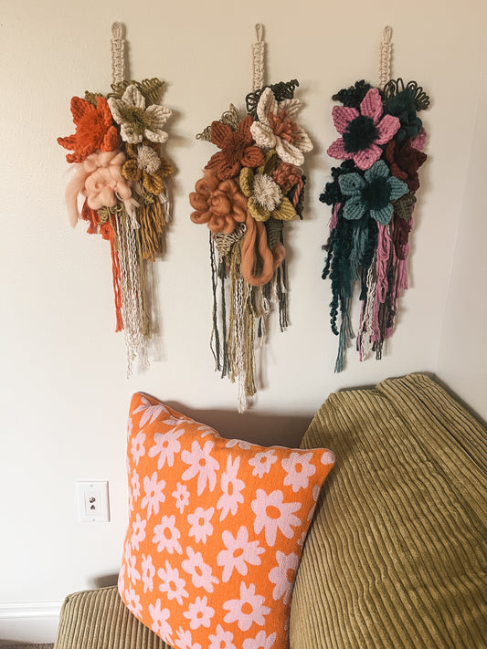 Grapefruit, mustard, + natural floral wall hanging