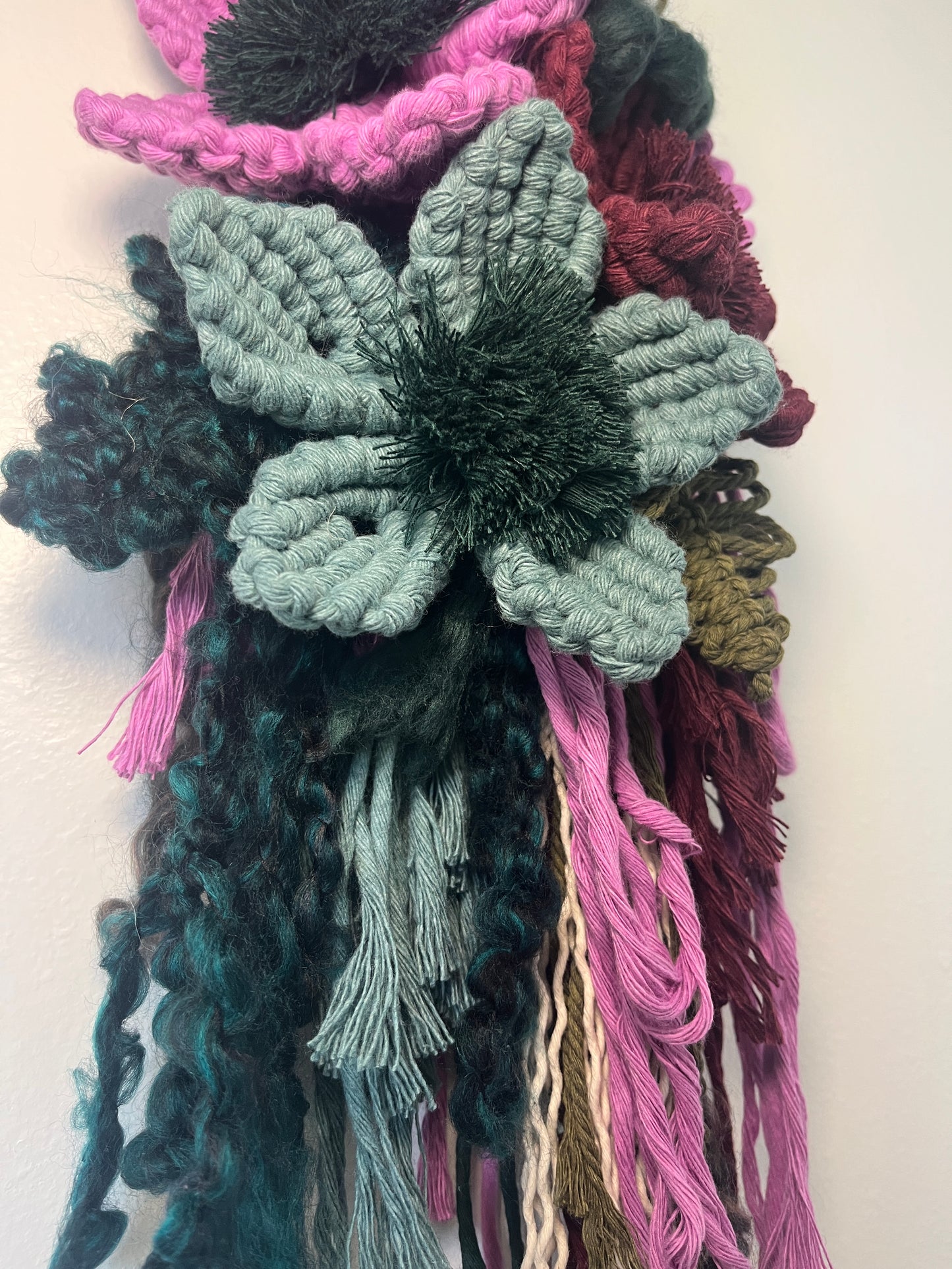 Lilac, Evergreen, + plum floral wall hanging