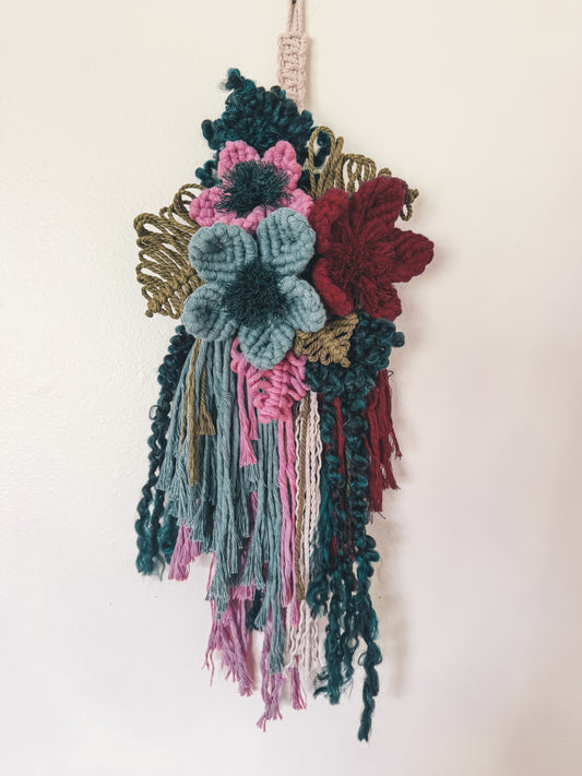 Moody floral wall hanging