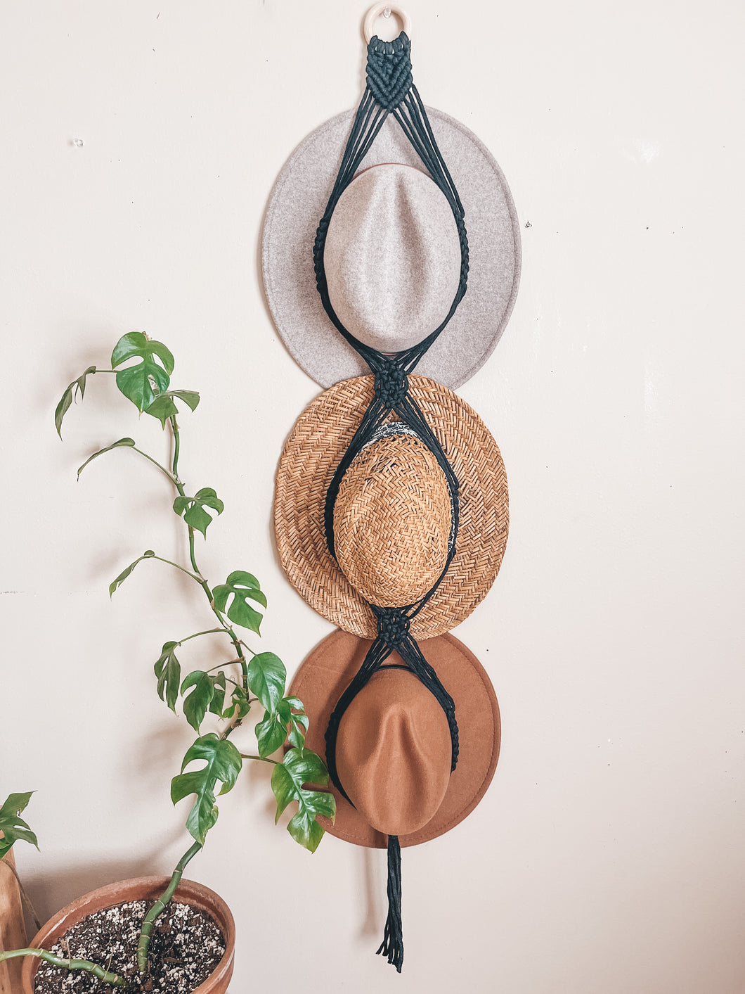 Triple hat hanger